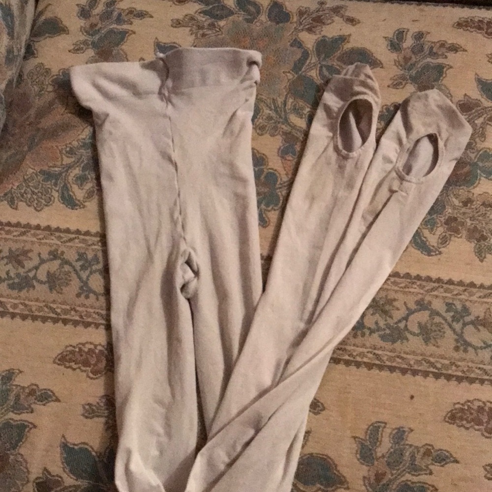 2 pair of Bloch dance tights.One pink and one tan